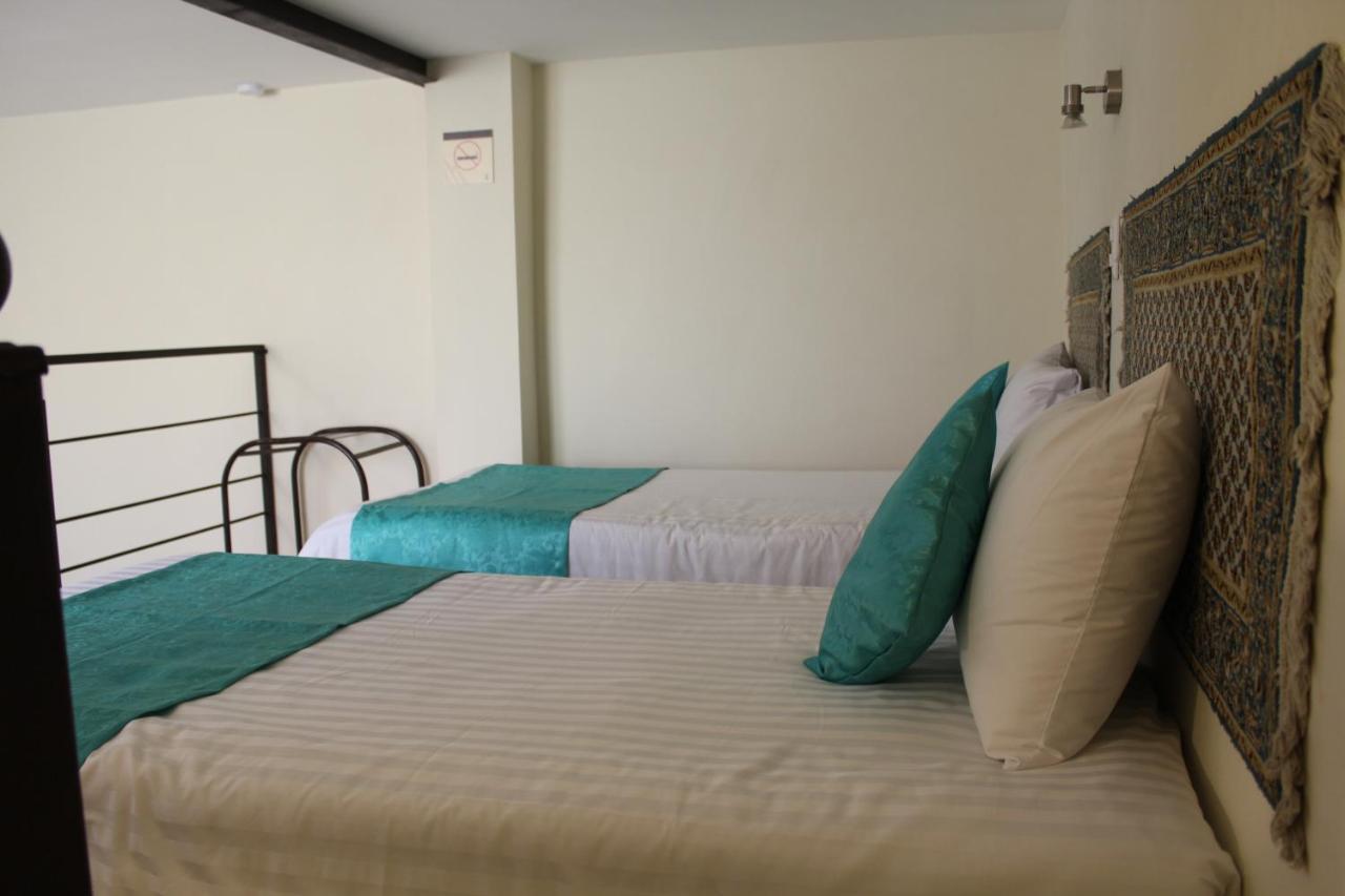 Casa Hotel Aroma 406 ปวยบลา ภายนอก รูปภาพ